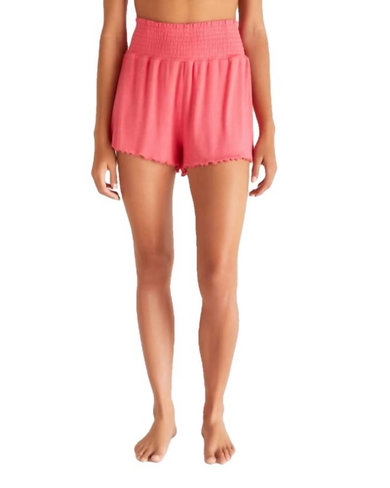 Front of a model wearing a size Large Dawn Smocked Rib Short In Watermelon in Watermelon by Z Supply. | dia_product_style_image_id:350918